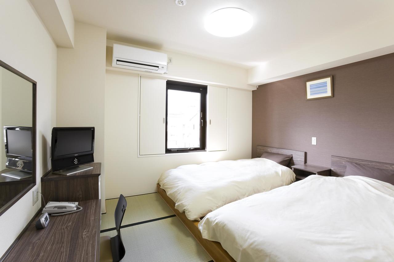Quarto com 2 Camas de Solteiro com Piso em Tatame - Não Fumantes